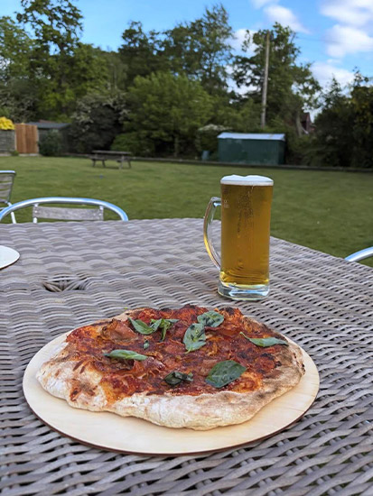 Fresh Pizza and a pint image